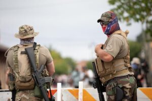 Members of far-right militias and white pride organizations rally near Stone Mountain Park in Stone Mountain, Georgia, on Aug. 15. Logan Cyrus/Getty Images